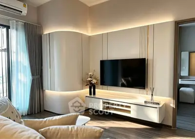 Modern living room with sleek TV setup and elegant lighting