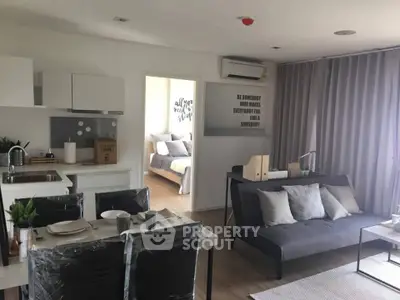 Modern open-plan living room with dining area and stylish decor