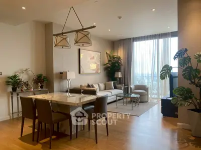 Luxurious living room with elegant decor and natural light in modern apartment.