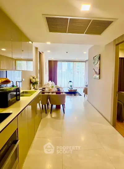 Spacious modern living room with open kitchen in luxury apartment