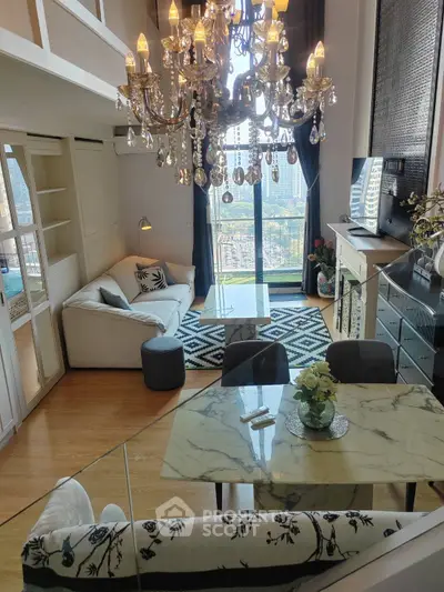 Luxurious living room with chandelier and city view, featuring elegant decor and modern furnishings.