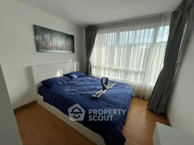 Cozy bedroom with elegant decor and natural light