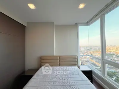 Modern bedroom with panoramic city view and sleek design