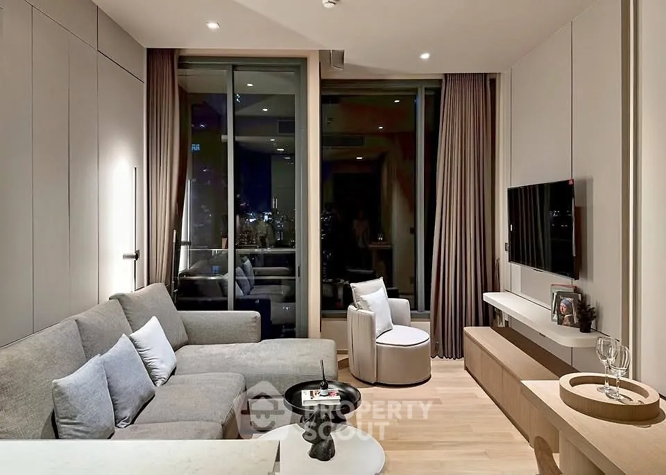Modern living room with sleek furniture and city view, perfect for urban living.