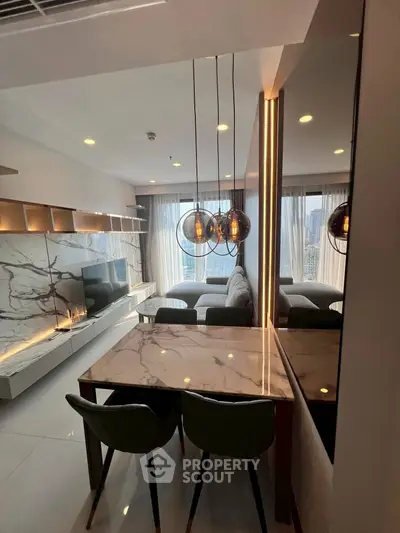 Luxurious modern living room with marble accents and elegant lighting