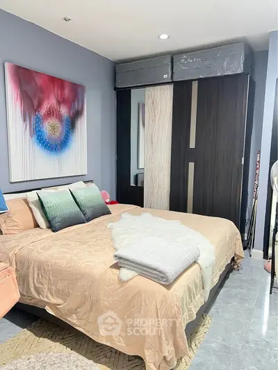 Modern bedroom with stylish decor and spacious wardrobe