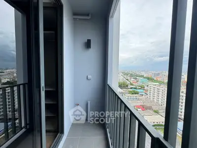 Modern balcony with city view in high-rise apartment