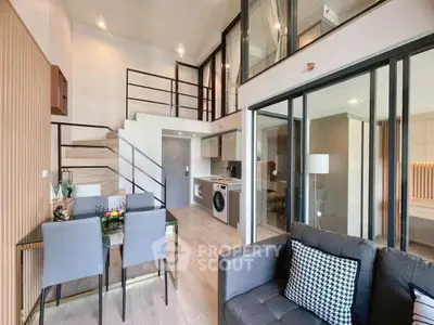 Modern duplex apartment with open layout and stylish furnishings