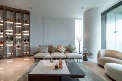 Luxurious modern living room with elegant decor and spacious seating area, perfect for relaxation and entertainment.