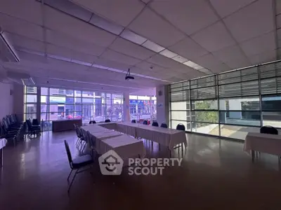 Spacious conference room with large windows and modern design