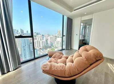 Luxurious high-rise apartment with stunning city view and modern interior design.