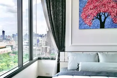 Luxurious bedroom with stunning city view and elegant decor