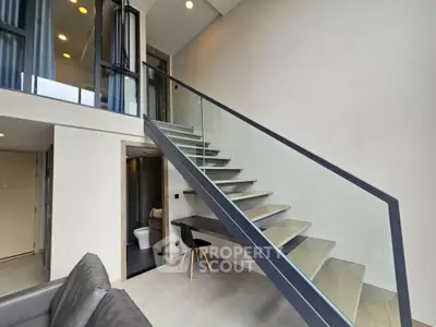 Modern duplex interior with sleek staircase and stylish design