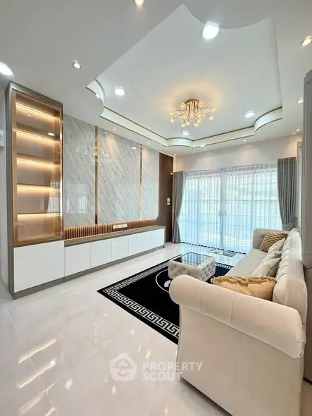 Luxurious modern living room with elegant lighting and plush seating