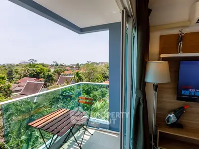 Charming balcony with scenic view and cozy interior, perfect for relaxation and enjoying nature.