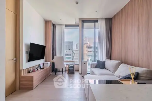 Modern living room with city view, sleek furniture, and natural light in luxury apartment.