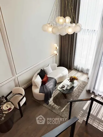 Luxurious modern living room with high ceilings, elegant chandelier, and stylish furniture, perfect for sophisticated living.