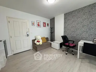 Modern study room with stylish decor and cozy seating area