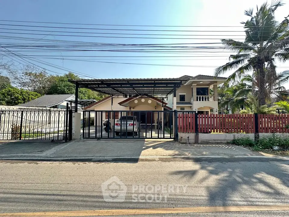 Charming suburban house with carport and lush palm trees, perfect for family living.