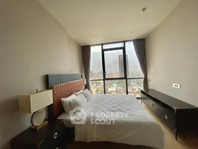 Luxurious bedroom with stunning city view and modern furnishings
