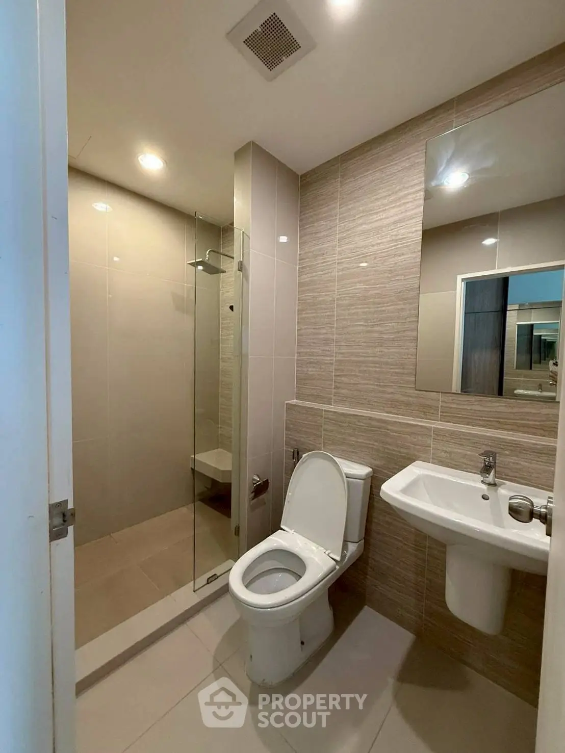 Modern bathroom with sleek design and glass shower enclosure