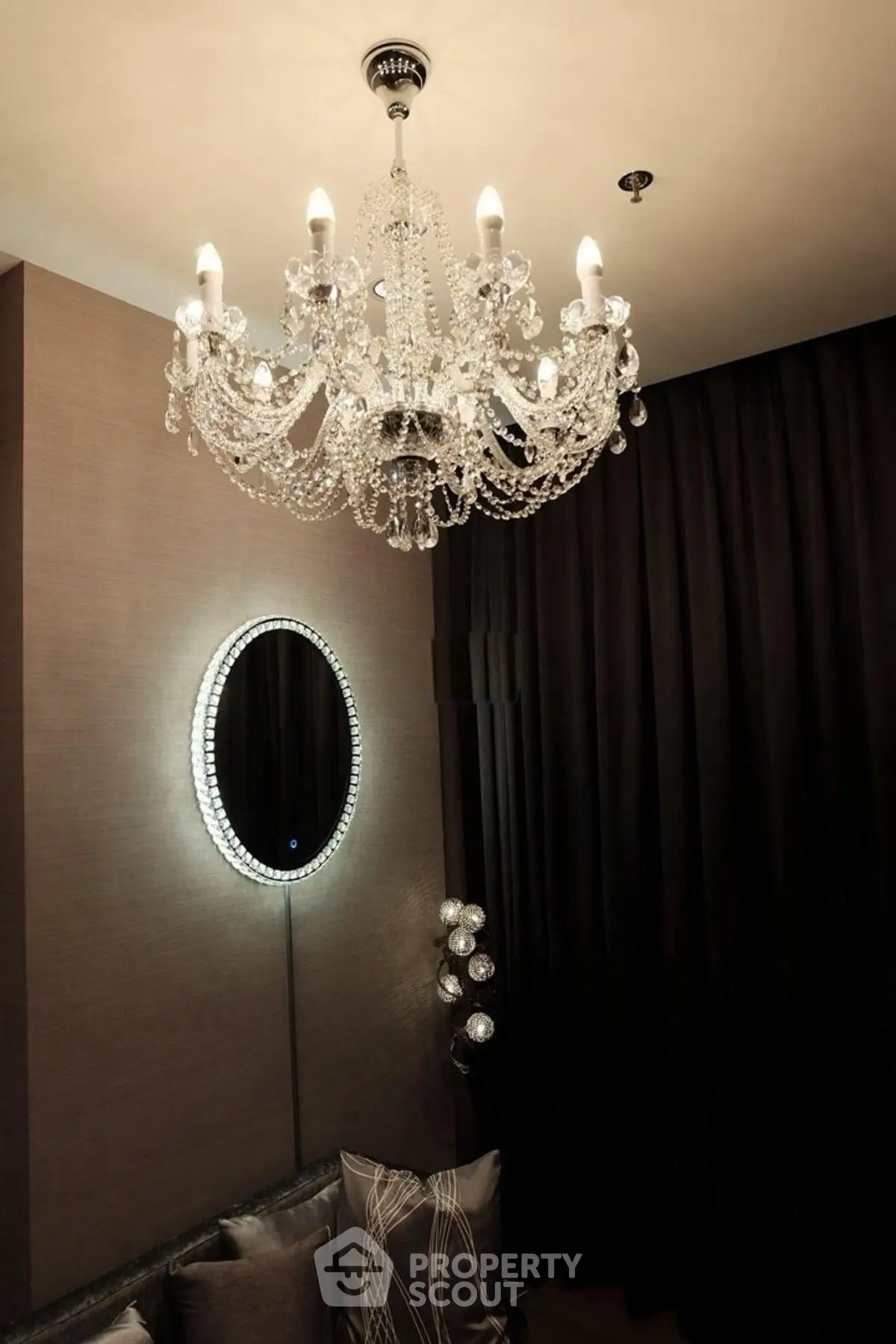 Elegant living room with luxurious chandelier and modern decor