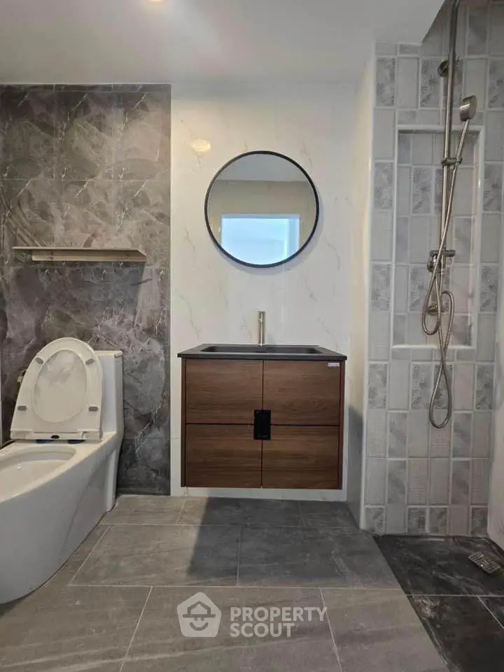 Modern bathroom with stylish fixtures and elegant tile design