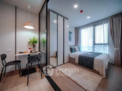 Modern bedroom with stylish decor and natural light