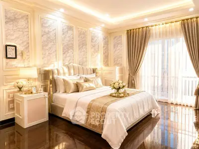Luxurious bedroom with elegant decor and natural light, featuring a plush bed and stylish curtains.