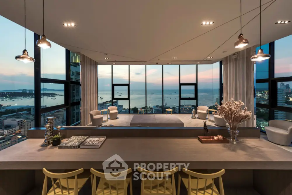 Luxurious living room with panoramic ocean views and modern decor