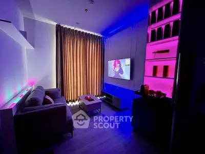 Modern living room with ambient lighting and sleek furniture