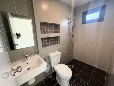 Modern bathroom with sleek fixtures and stylish tile design