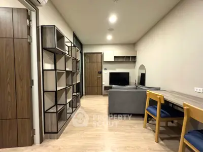 Modern living room with stylish furniture and open layout in a contemporary apartment.