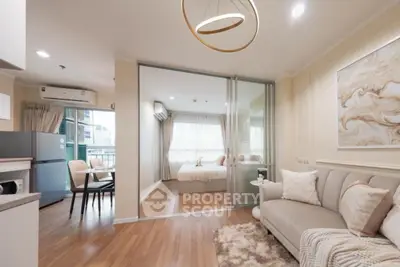 Modern open-plan living room with elegant decor and cozy ambiance