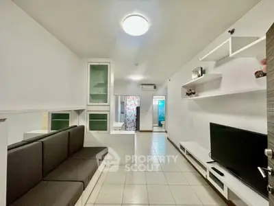 Modern living room with built-in seating and sleek shelving, perfect for contemporary living.