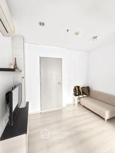 Modern minimalist living room with sleek design and neutral tones