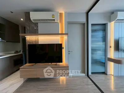 Modern living room with sleek TV unit and ambient lighting