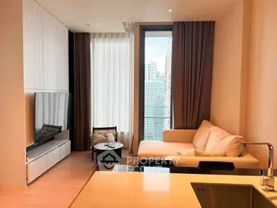 Modern living room with large window and city view, featuring a cozy sofa and sleek TV setup.