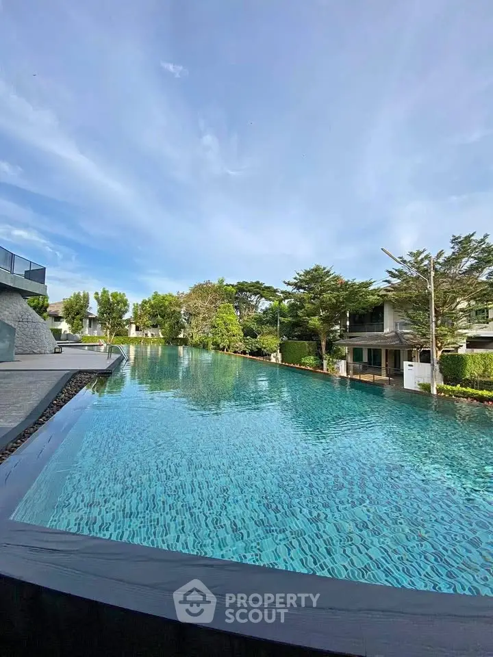 Luxurious residential pool with serene surroundings and modern architecture