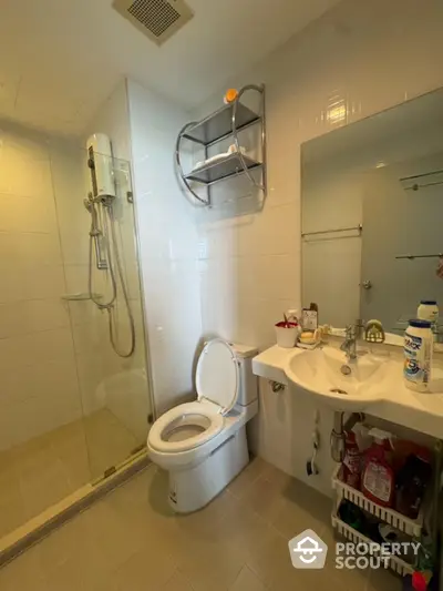 Modern bathroom with glass shower and sleek fixtures