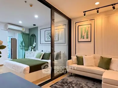 Modern studio apartment with stylish decor and cozy living area.