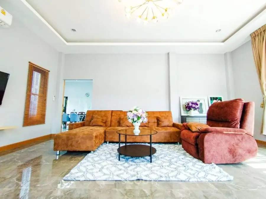 Spacious living room with modern furniture and elegant decor