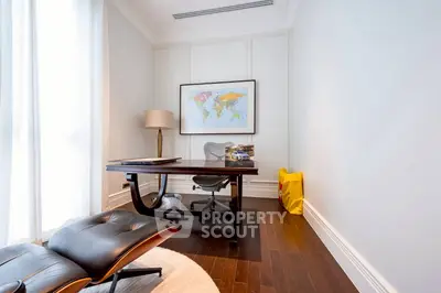 Elegant study room with modern desk and world map decor