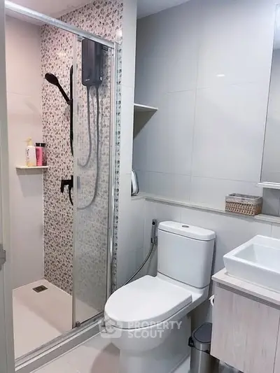 Modern bathroom with sleek shower and contemporary fixtures