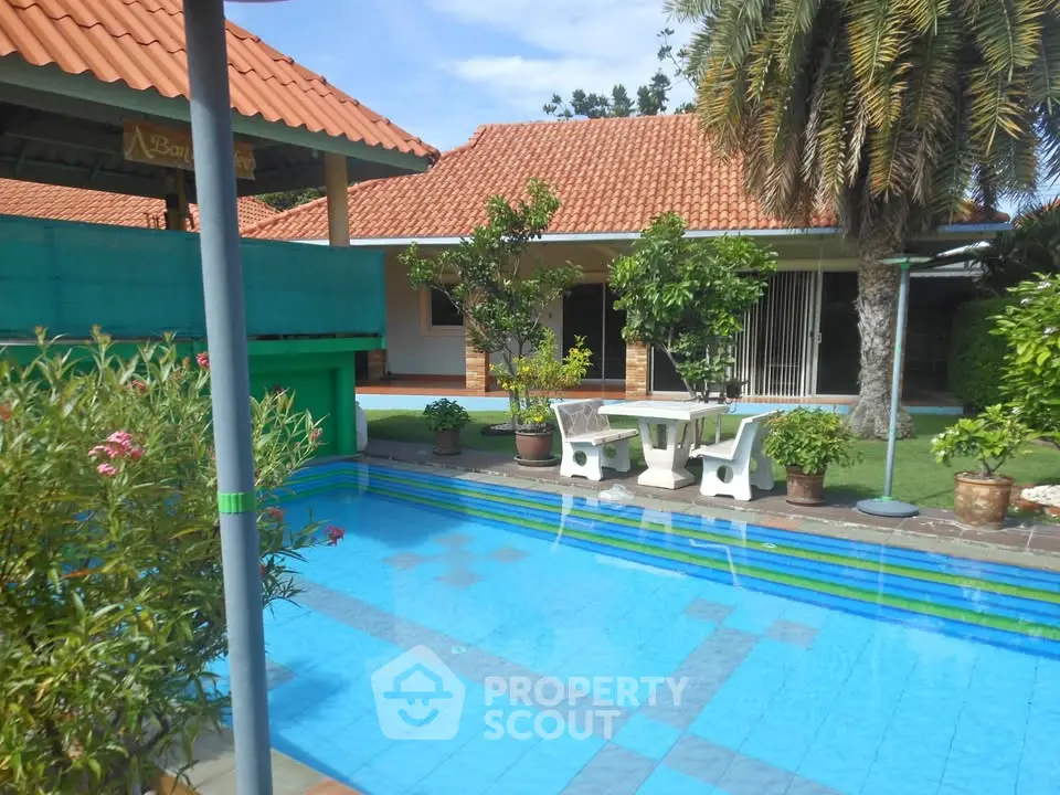 Charming property with inviting pool and lush garden, perfect for relaxation and outdoor enjoyment.