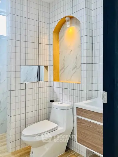 Modern bathroom with stylish tile design and contemporary fixtures