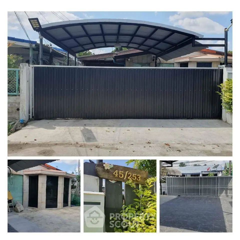 Modern gated property with sleek design and spacious driveway