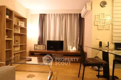 Modern living room with stylish furniture and warm lighting