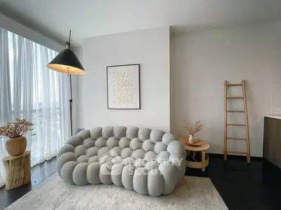 Stylish modern living room with unique sofa and elegant decor