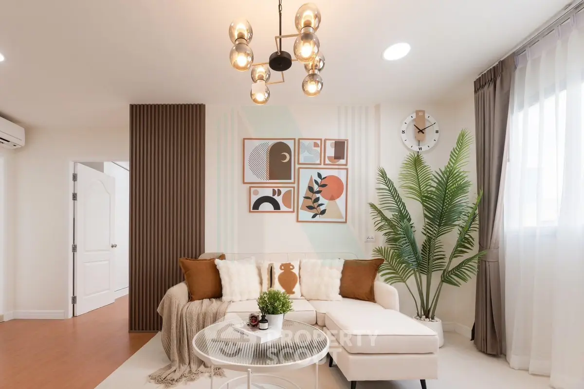 Stylish living room with modern decor, cozy sofa, and elegant lighting